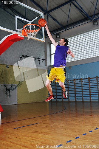 Image of basket ball game player at sport hall