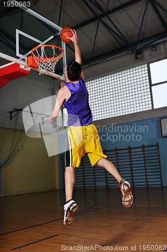 Image of basket ball game player at sport hall