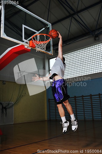 Image of basket ball game player at sport hall