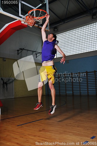 Image of basket ball game player at sport hall
