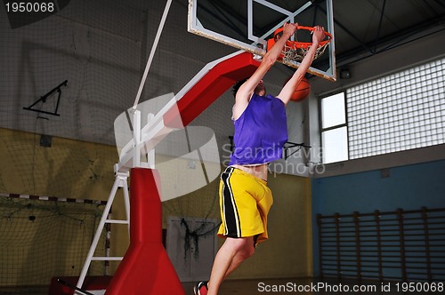 Image of basket ball game player at sport hall
