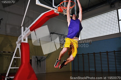 Image of basket ball game player at sport hall
