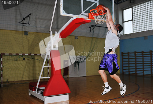 Image of basket ball game player at sport hall