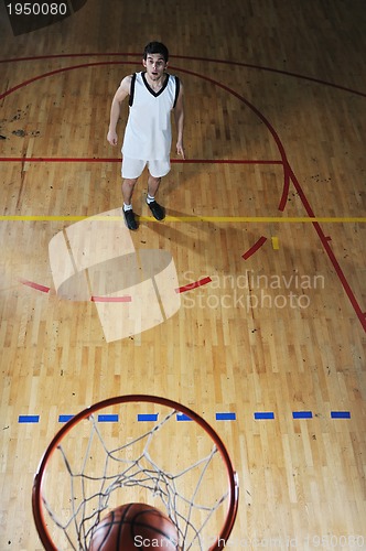 Image of basket ball game player at sport hall