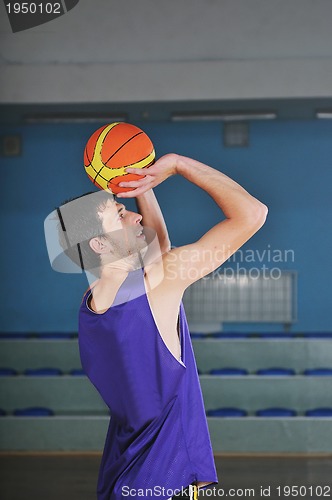 Image of basket ball game player at sport hall