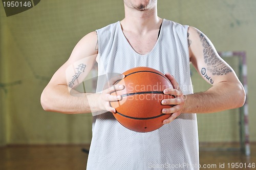 Image of basket ball game player at sport hall