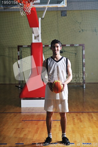 Image of basket ball game player at sport hall