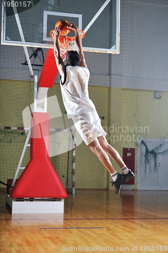 Image of basket ball game player at sport hall