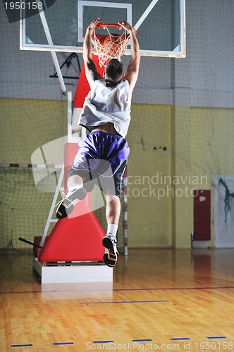 Image of basket ball game player at sport hall