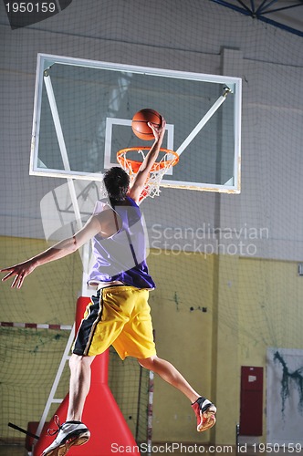 Image of basket ball game player at sport hall