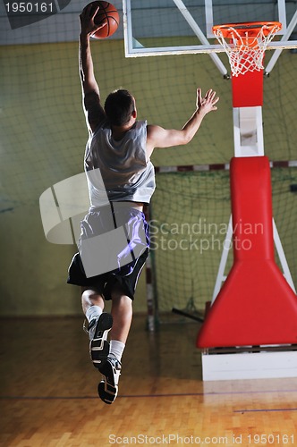 Image of basket ball game player at sport hall