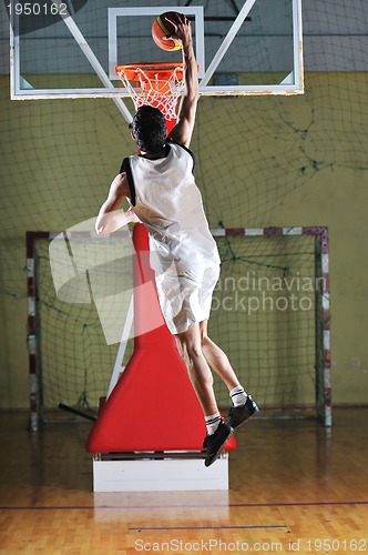 Image of basket ball game player at sport hall