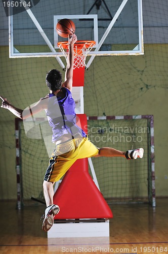 Image of basket ball game player at sport hall