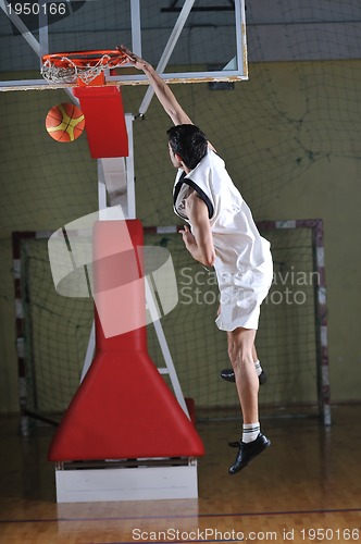 Image of basket ball game player at sport hall
