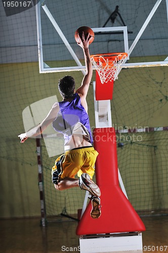 Image of basket ball game player at sport hall