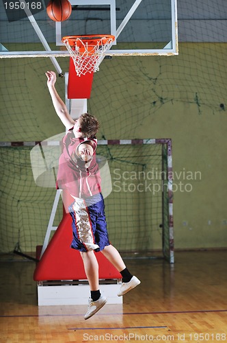 Image of basket ball game player at sport hall