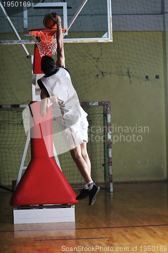 Image of basket ball game player at sport hall