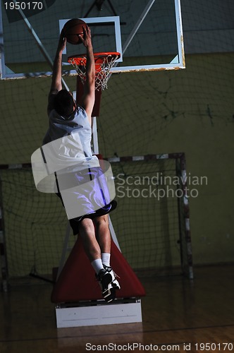 Image of basket ball game player at sport hall