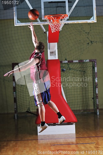Image of basket ball game player at sport hall