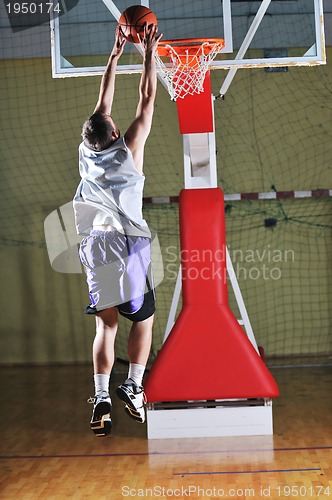Image of basket ball game player at sport hall