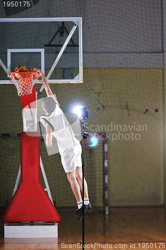 Image of basket ball game player at sport hall