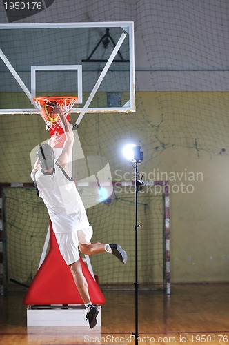 Image of basket ball game player at sport hall