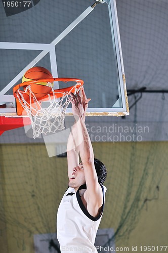 Image of basket ball game player at sport hall