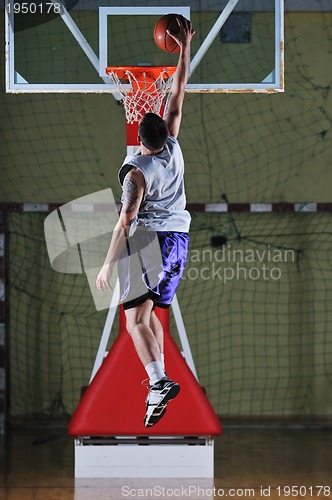 Image of basket ball game player at sport hall