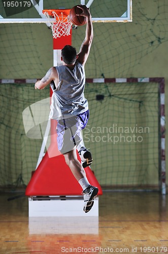 Image of basket ball game player at sport hall