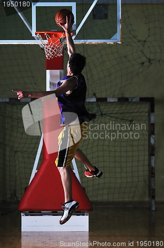 Image of basket ball game player at sport hall
