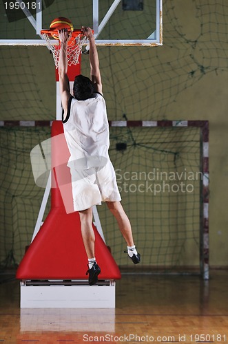 Image of basket ball game player at sport hall