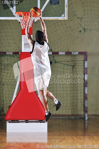 Image of basket ball game player at sport hall