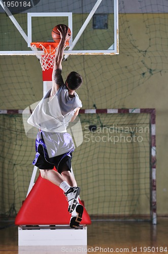 Image of basket ball game player at sport hall