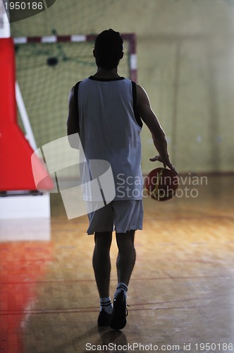 Image of basket ball game player at sport hall