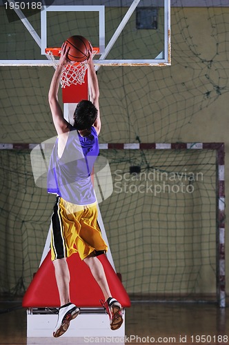 Image of basket ball game player at sport hall