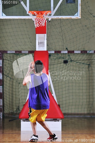 Image of basket ball game player at sport hall