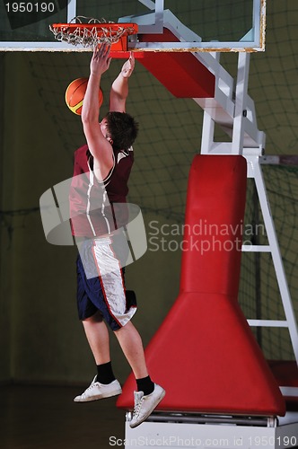 Image of basket ball game player at sport hall
