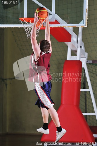 Image of basket ball game player at sport hall