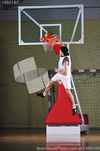 Image of basket ball game player at sport hall
