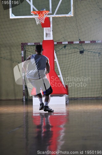 Image of basket ball game player at sport hall