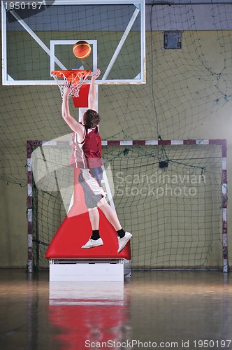 Image of basket ball game player at sport hall