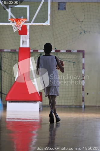 Image of basket ball game player at sport hall