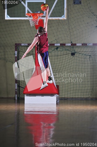 Image of basket ball game player at sport hall