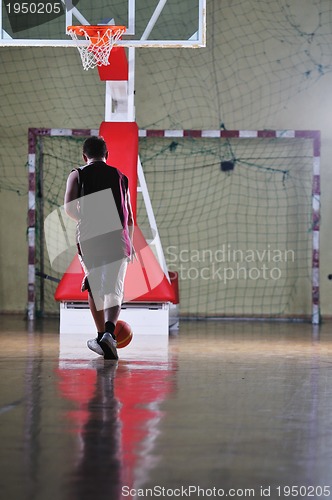 Image of basket ball game player at sport hall