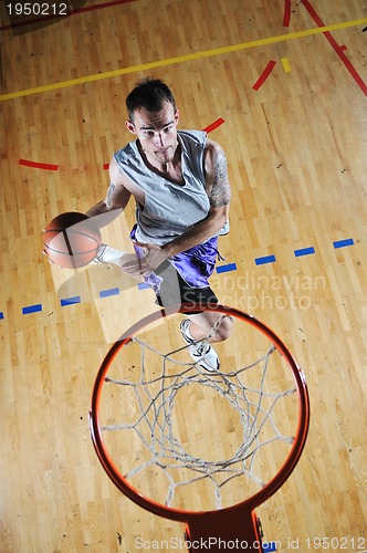 Image of basket ball game player at sport hall