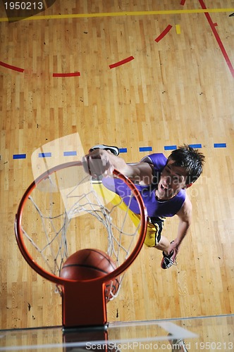 Image of basket ball game player at sport hall