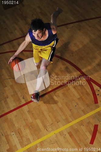 Image of basket ball game player at sport hall