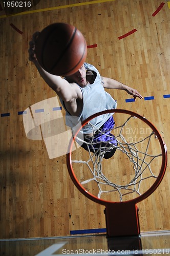 Image of basket ball game player at sport hall