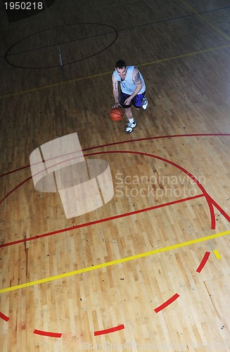 Image of basket ball game player at sport hall