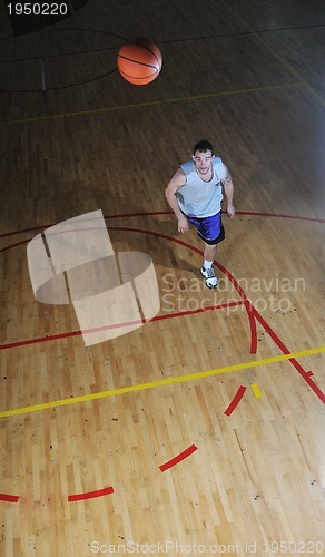 Image of basket ball game player at sport hall
